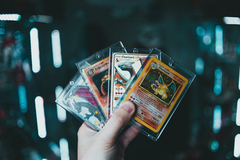 Pokémon cards in hand